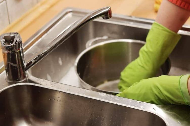 Removing a drain cover from a sink